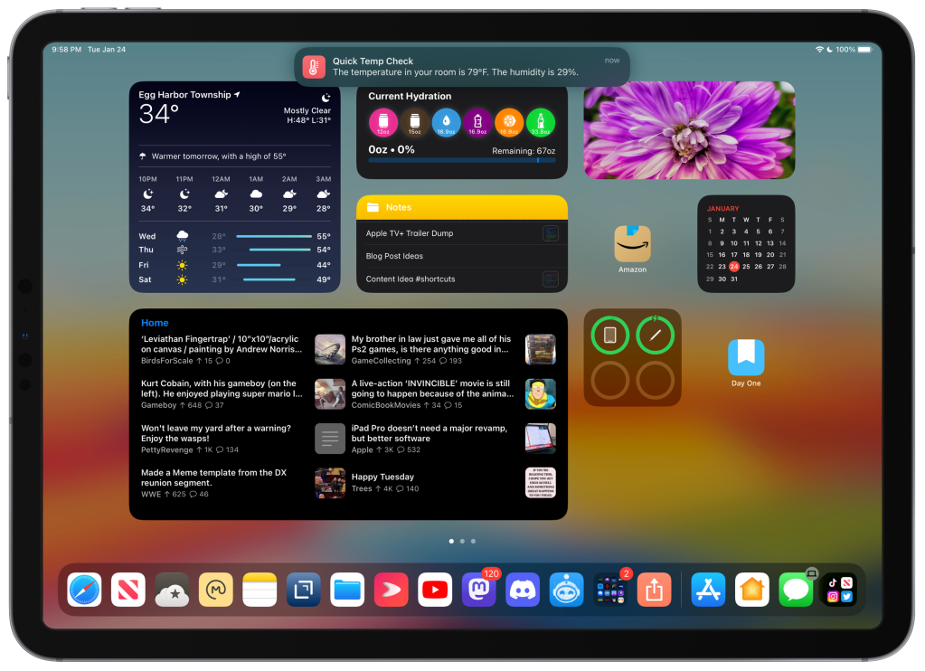 An iPad Pro Home Screen showing the Quick Temp Notification as a banner at the top of the screen. 